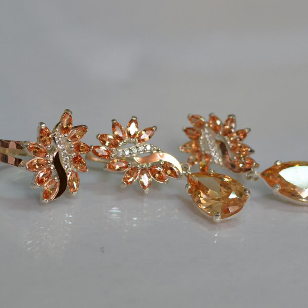 Срібний набір з золотими пластинами