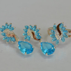 Срібний набір з золотими пластинами