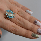 Срібна каблучка з золотими вставками