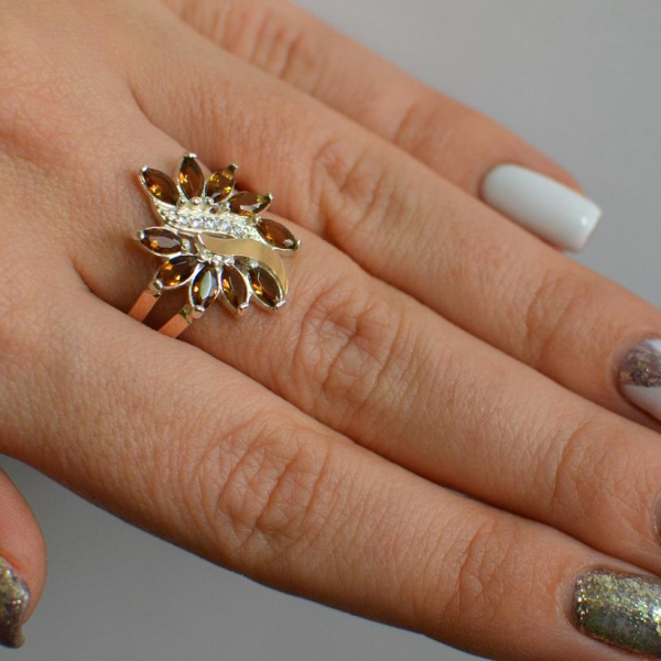 Срібна каблучка з золотими вставками