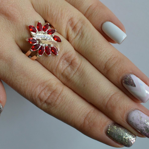 Срібна каблучка з золотими вставками