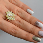 Срібна каблучка з золотими вставками