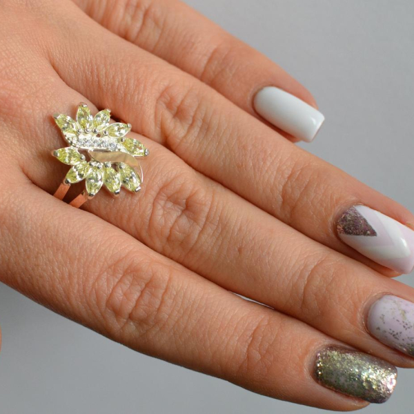 Срібна каблучка з золотими вставками