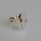 Срібна каблучка з золотими вставками