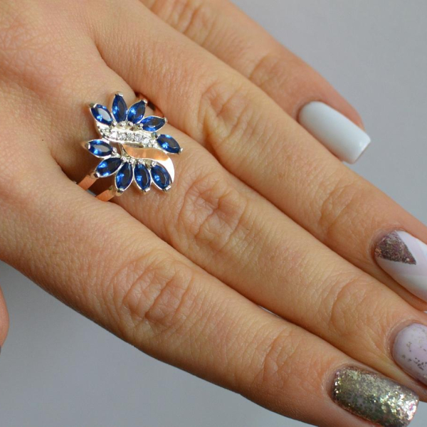 Срібна каблучка з золотими вставками