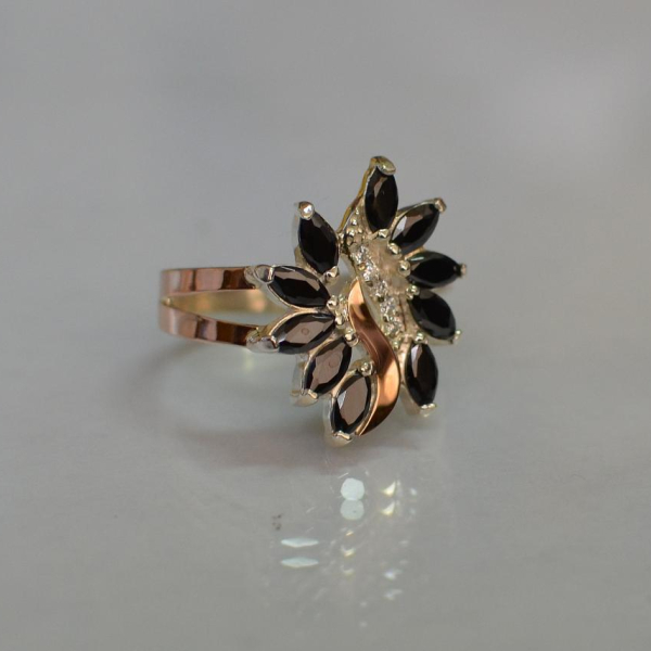 Срібна каблучка з золотими вставками