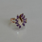 Срібна каблучка з золотими вставками