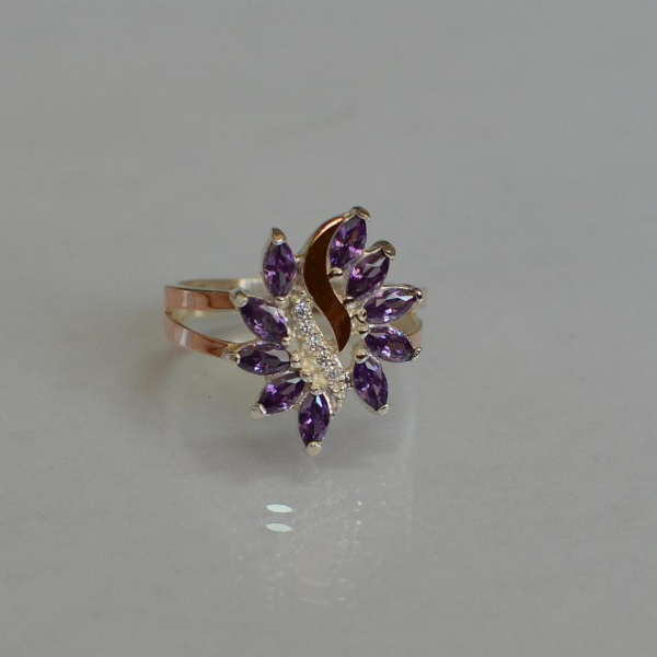 Срібна каблучка з золотими вставками