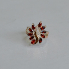 Срібна каблучка з золотими вставками