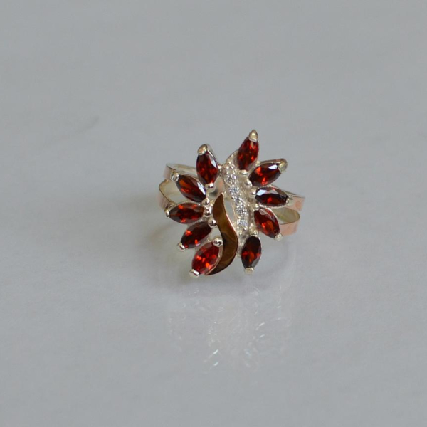 Срібна каблучка з золотими вставками