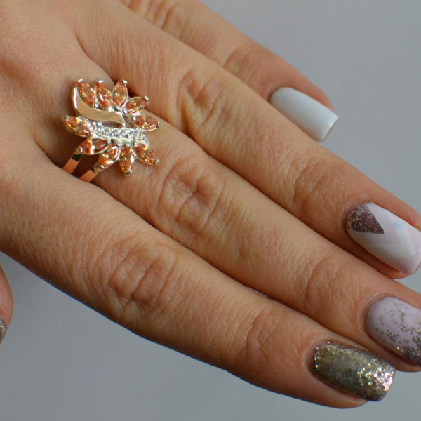 Срібна каблучка з золотими вставками