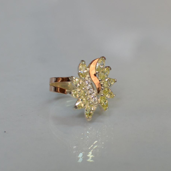 Срібна каблучка з золотими вставками