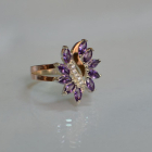 Срібна каблучка з золотими вставками