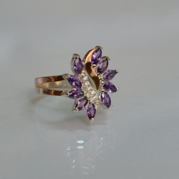 Срібна каблучка з золотими вставками