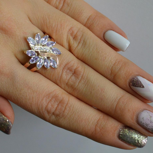 Срібна каблучка з золотими вставками