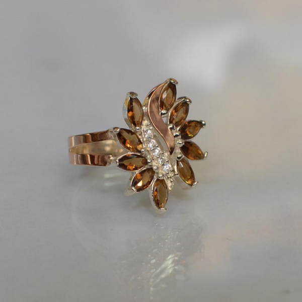 Срібна каблучка з золотими вставками