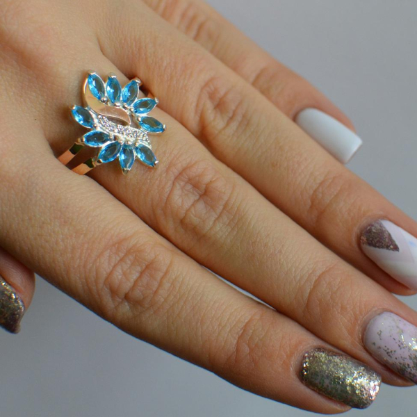 Срібна каблучка з золотими вставками