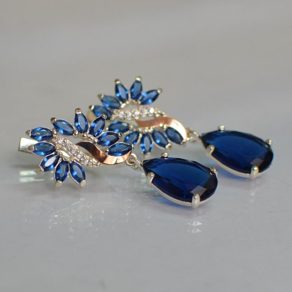 Срібні сережки з золотими вставками