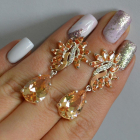 Срібні сережки з золотими вставками