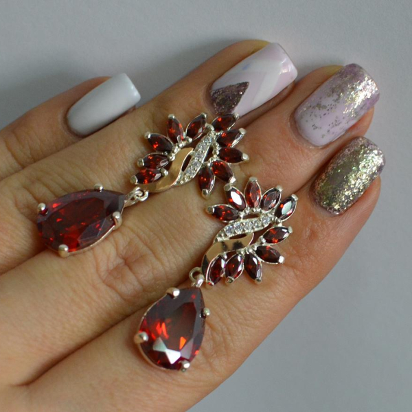 Срібні сережки з золотими вставками