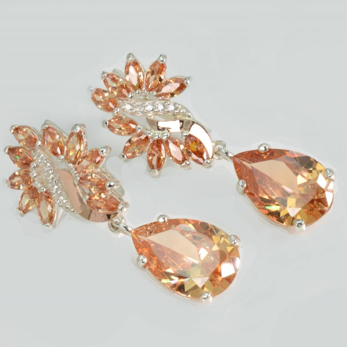 Срібні сережки з золотими вставками