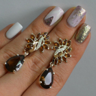 Срібні сережки з золотими вставками