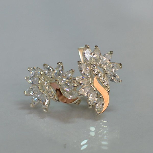 Срібні сережки з золотими вставками