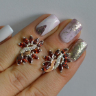 Срібні сережки з золотими вставками