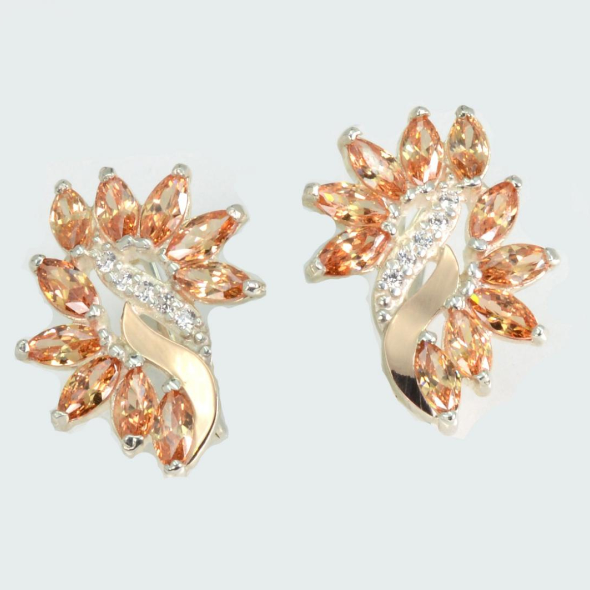 Срібні сережки з золотими вставками