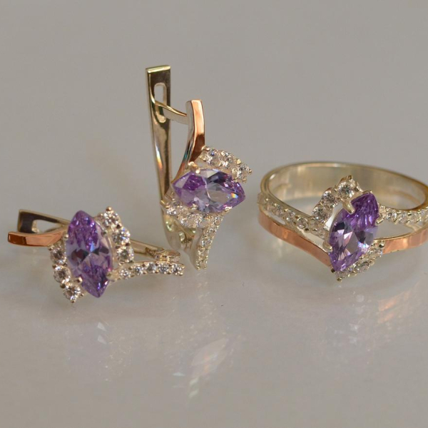 Срібний набір з золотими пластинами