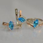 Срібний набір з золотими пластинами