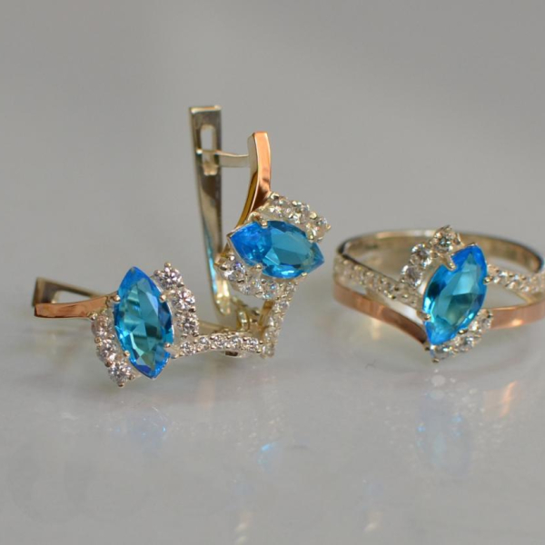 Срібний набір з золотими пластинами