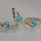 Срібний набір з золотими пластинами