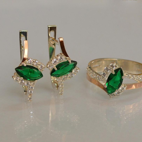 Срібний набір з золотими пластинами