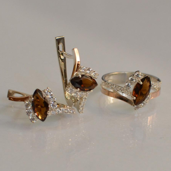 Срібний набір з золотими пластинами