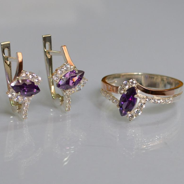 Срібний набір з золотими пластинами