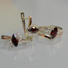 Срібний набір з золотими пластинами