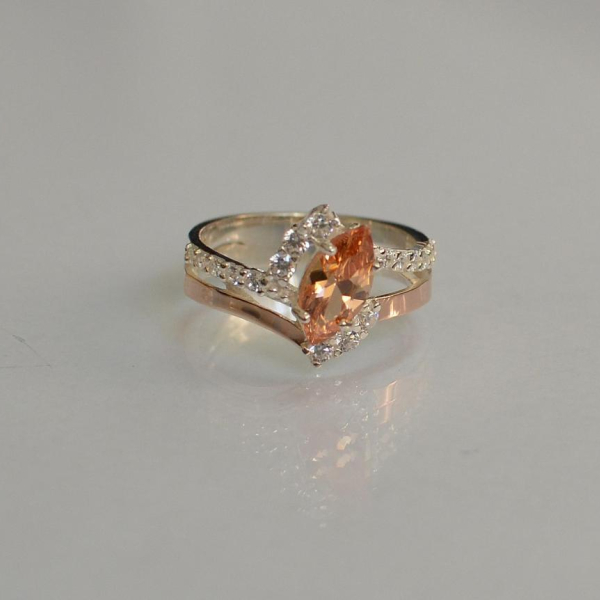 Срібна каблучка з золотими вставками