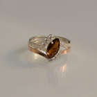 Срібна каблучка з золотими вставками