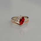 Срібна каблучка з золотими вставками