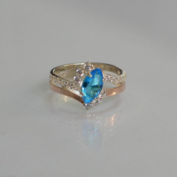 Срібна каблучка з золотими вставками