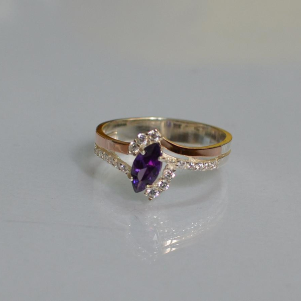 Срібна каблучка з золотими вставками