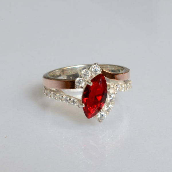 Срібна каблучка з золотими вставками