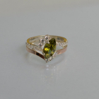 Срібна каблучка з золотими вставками