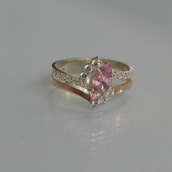 Срібна каблучка з золотими вставками