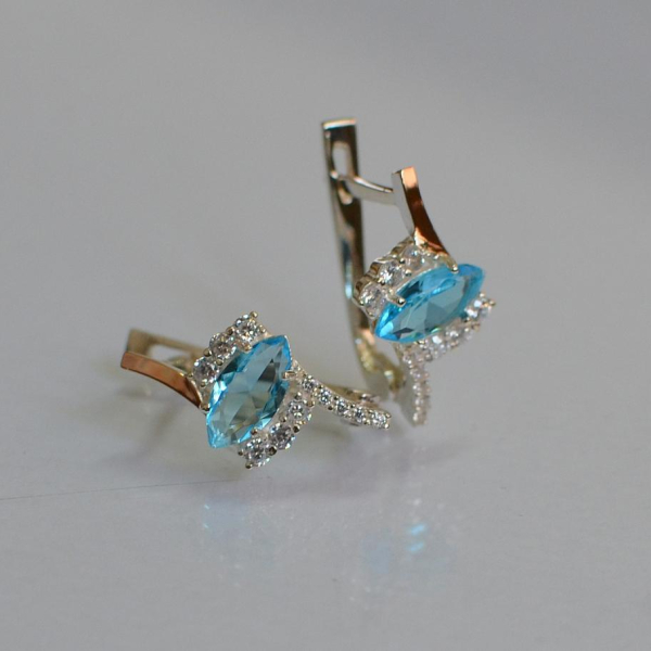 Срібні сережки з золотими вставками