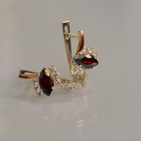 Срібні сережки з золотими вставками