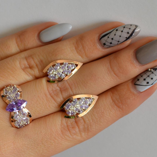 Срібний набір з золотими пластинами