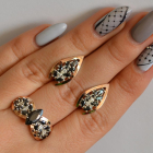 Срібний набір з золотими пластинами