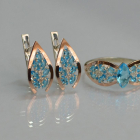 Срібний набір з золотими пластинами